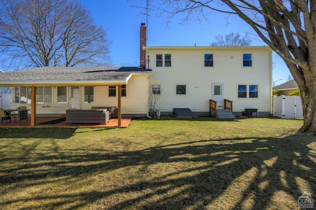25 Joslen Pl, Hudson, NY 12534 - rear view of property featuring a chimney, entry steps, outdoor lounge area, and a patio area