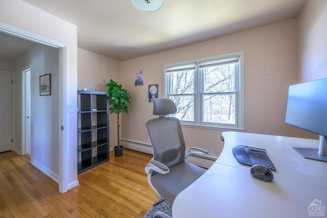 25 Joslen Pl, Hudson, NY 12534 - office area with baseboard heating, light wood finished floors, and baseboards