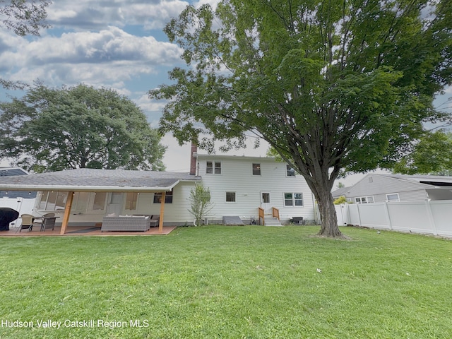 25 Joslen Pl, Hudson, NY 12534 - rear view of property featuring a patio and an outdoor hangout area