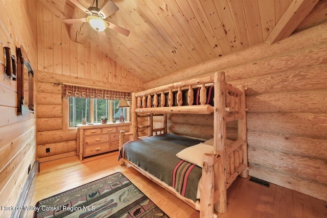 bedroom with hardwood / wood-style floors, ceiling fan, and wooden ceiling