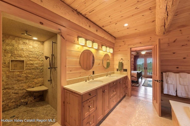 bathroom with wood walls, hardwood / wood-style floors, a shower, vanity, and wood ceiling