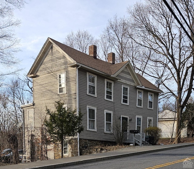 36 Spring St, Chatham, NY 12037 - view of front of house with a chimney