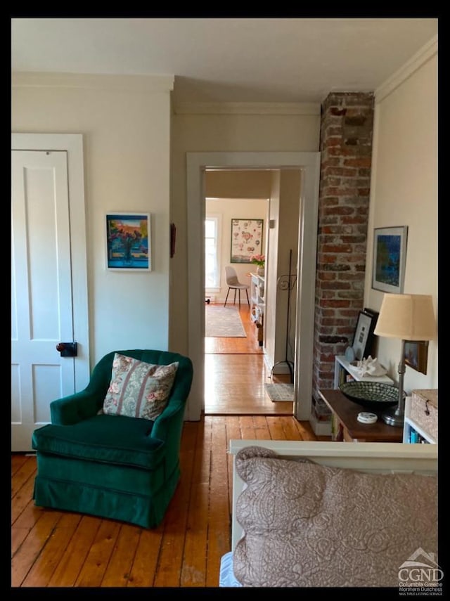 36 Spring St, Chatham, NY 12037 - living area featuring hardwood / wood-style flooring and crown molding