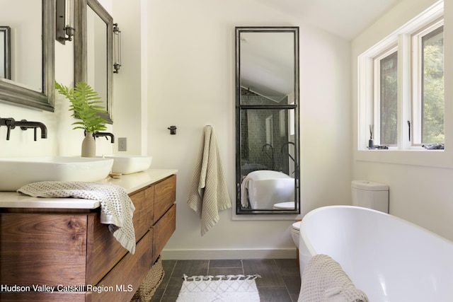 46 Rose Ln, Woodstock, NY 12409 - full bath with vanity, a soaking tub, a shower stall, tile patterned floors, and lofted ceiling