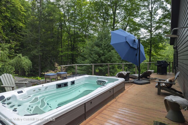 46 Rose Ln, Woodstock, NY 12409 - wooden deck featuring grilling area and a forest view