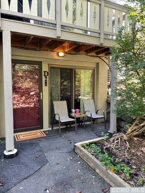 64 Highlands Dr Unit D 2, Hunter, NY 12442 - doorway to property featuring a balcony and a patio