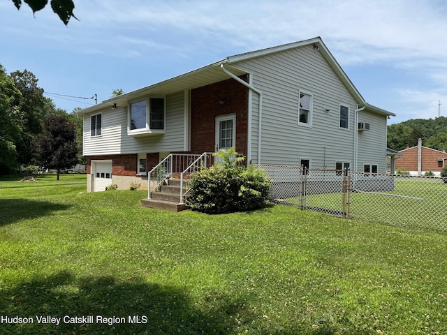 39 Maple Ln, Dover Plains, NY 12522 - rear view of house featuring brick siding and an attached garage