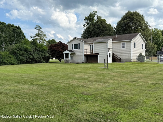 39 Maple Ln, Dover Plains, NY 12522 - back of house with a yard, a wooden deck, and stairs