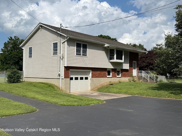39 Maple Ln, Dover Plains, NY 12522 - view of side of home with asphalt driveway and a garage