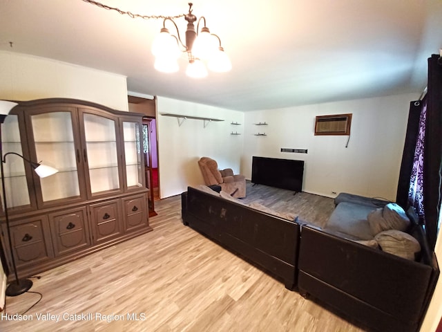 14 Center Rd, High Falls, NY 12440 - living area with a chandelier, light wood-style flooring, and a wall mounted AC