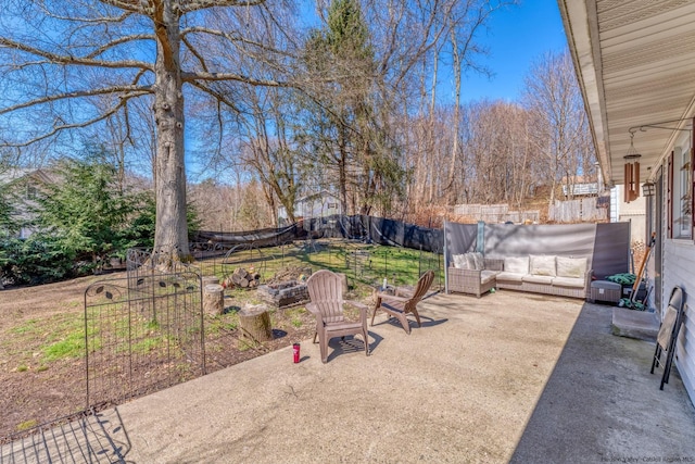 view of patio / terrace featuring fence