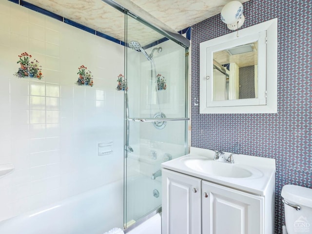 161 Beaver Hill Rd, Gilboa, NY 12076 - bathroom featuring wallpapered walls, combined bath / shower with glass door, toilet, and vanity