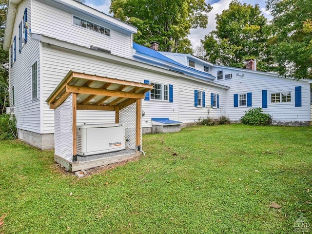 161 Beaver Hill Rd, Gilboa, NY 12076 - rear view of property featuring a chimney and a yard