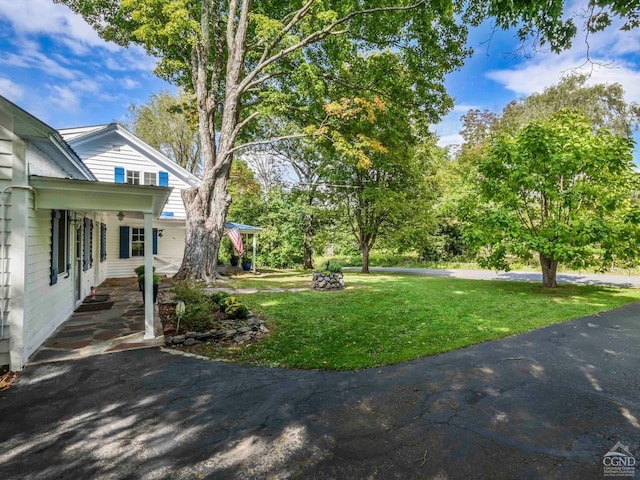 161 Beaver Hill Rd, Gilboa, NY 12076 - view of green lawn featuring a porch