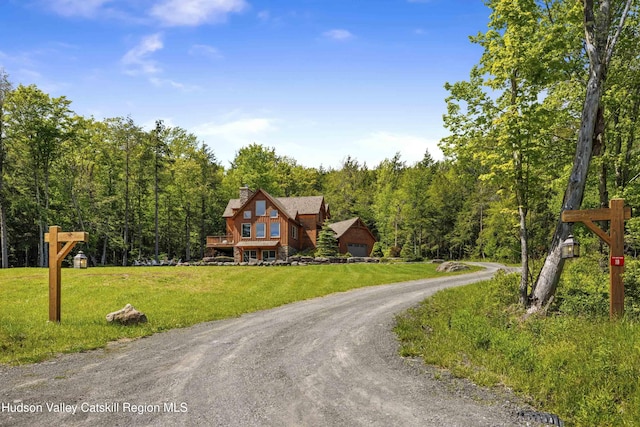 16 High W Rd, Windham, NY 12496 - rustic home with a front lawn, a forest view, dirt driveway, and a chimney