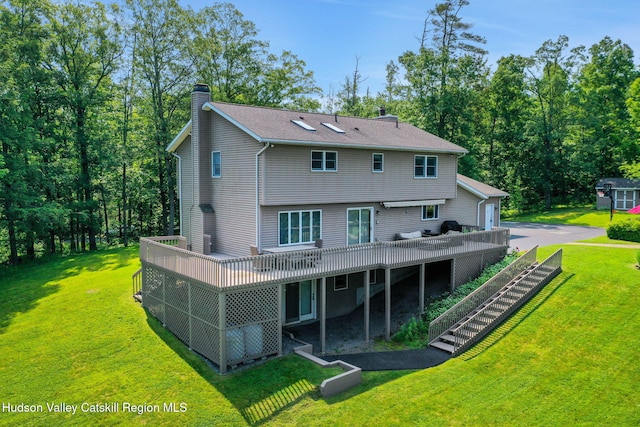 14 Glenerie Ln, Saugerties, NY 12477 - rear view of property featuring a chimney, stairs, a wooden deck, and a lawn