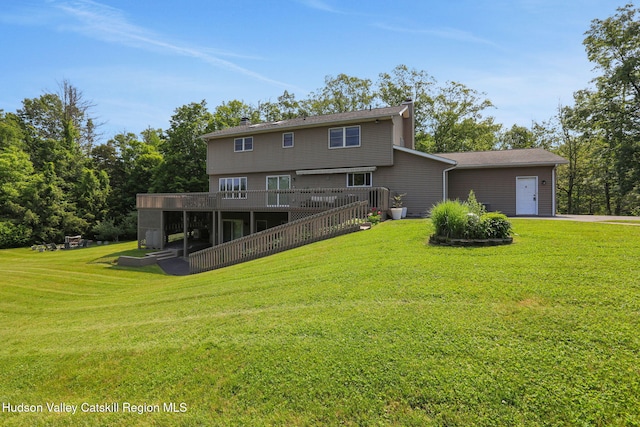 14 Glenerie Ln, Saugerties, NY 12477 - back of property with a wooden deck and a yard