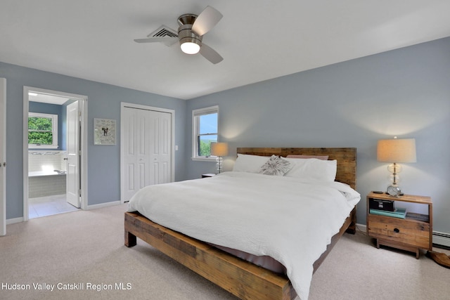 14 Glenerie Ln, Saugerties, NY 12477 - bedroom featuring light colored carpet, a closet, multiple windows, and connected bathroom