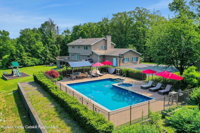 14 Glenerie Ln, Saugerties, NY 12477 - view of pool with a playground, an in-ground hot tub, and a patio area