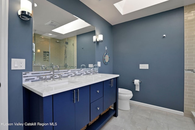 14 Glenerie Ln, Saugerties, NY 12477 - bathroom with a skylight, a stall shower, double vanity, tile patterned floors, and tasteful backsplash