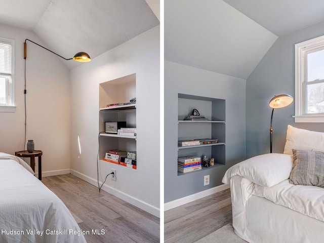 bedroom with lofted ceiling, light wood finished floors, and multiple windows