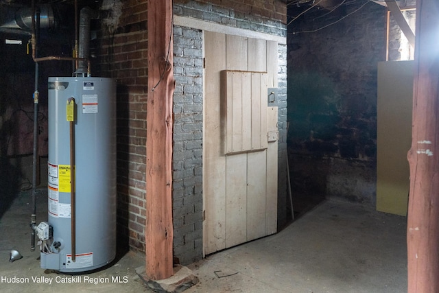 basement featuring gas water heater