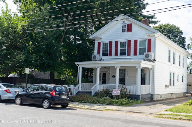 view of front of house with ac unit