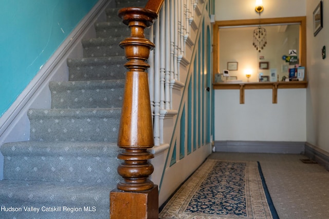 stairs with carpet floors