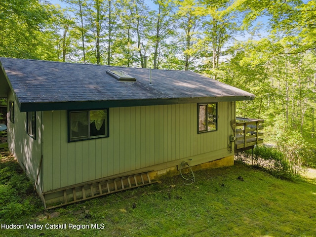 101 Hunter Ln, Hunter, NY 12442 - view of side of home featuring a shingled roof