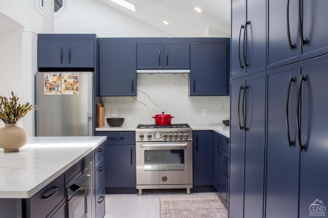41 Snydertown Rd, Craryville, NY 12521 - kitchen featuring stainless steel appliances, blue cabinets, decorative backsplash, recessed lighting, and under cabinet range hood