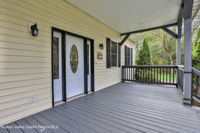 wooden terrace with covered porch