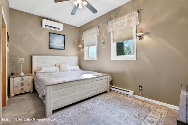 carpeted bedroom featuring a baseboard radiator, an AC wall unit, and ceiling fan