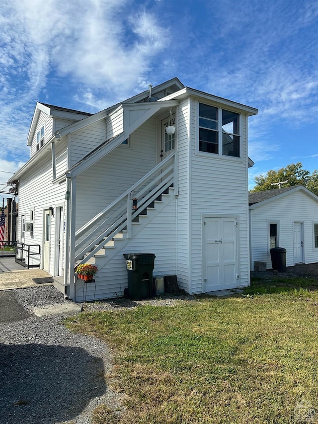 2 Hudson Ave, Stuyvesant, NY 12173 - view of side of home with a lawn and stairway