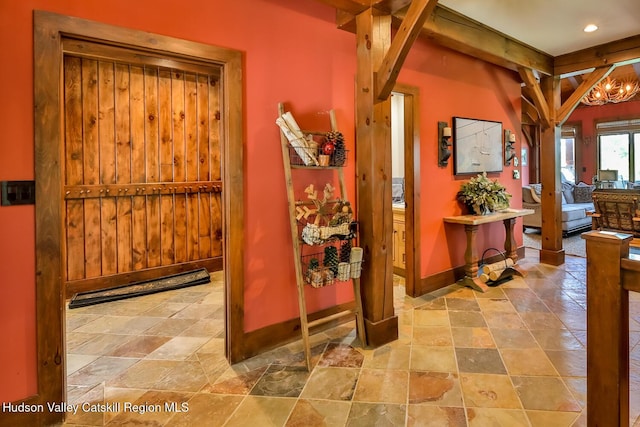 2 Watch Hill Ln Unit 2, Windham, NY 12496 - entrance foyer with stone tile floors, recessed lighting, and a chandelier