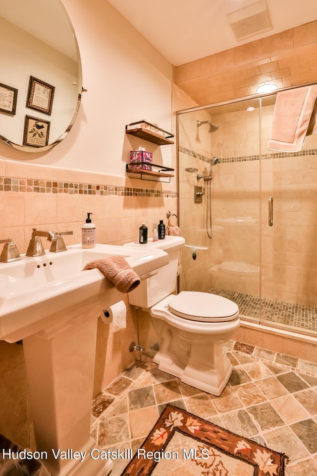 2 Watch Hill Ln Unit 2, Windham, NY 12496 - bathroom with tile walls and a shower stall