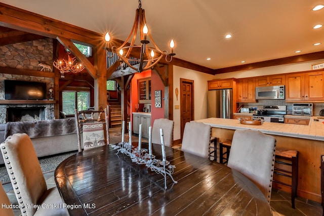 2 Watch Hill Ln Unit 2, Windham, NY 12496 - dining area featuring a chandelier, stairway, recessed lighting, dark wood-style floors, and a stone fireplace