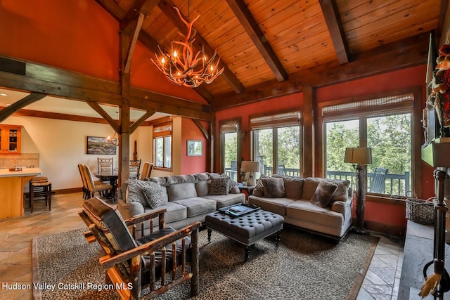 2 Watch Hill Ln Unit 2, Windham, NY 12496 - living room featuring stone tile floors, a chandelier, and wooden ceiling