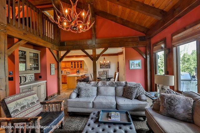 2 Watch Hill Ln Unit 2, Windham, NY 12496 - living area featuring a chandelier, beamed ceiling, and high vaulted ceiling