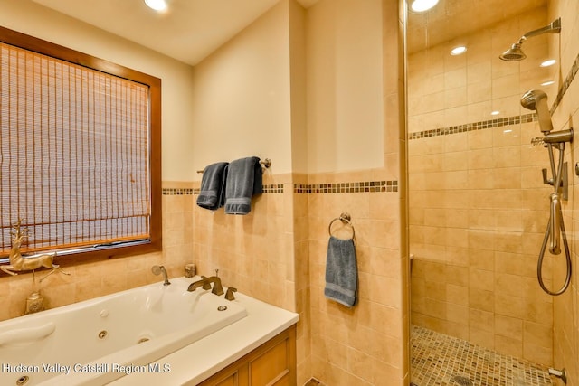 2 Watch Hill Ln Unit 2, Windham, NY 12496 - bathroom with a shower stall, tile walls, a tub with jets, a wainscoted wall, and recessed lighting