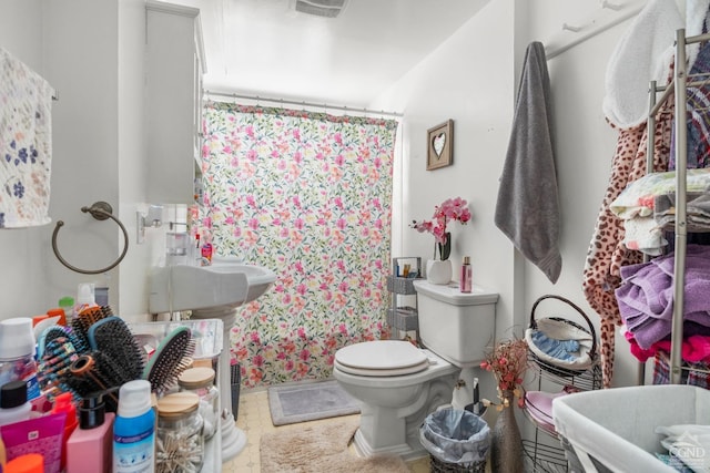 10-12 School St, Chatham, NY 12037 - full bathroom featuring toilet and a shower with shower curtain