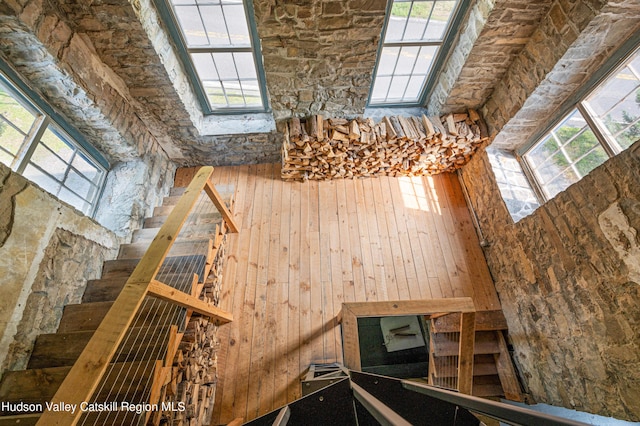 staircase with a wealth of natural light