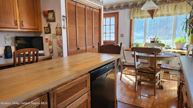 dining room with hardwood / wood-style flooring