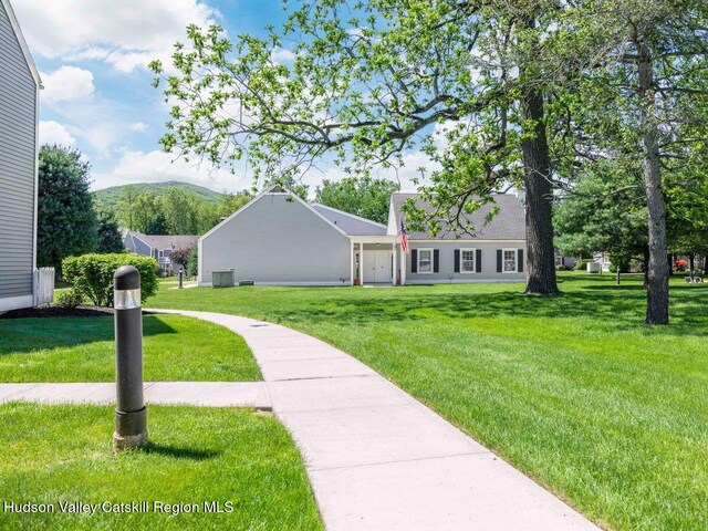 902 Commons Way Unit B, Fishkill, NY 12524 - surrounding community featuring a lawn and a mountain view