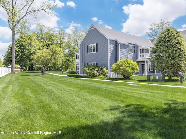 902 Commons Way Unit B, Fishkill, NY 12524 - view of side of home featuring a yard and a shingled roof
