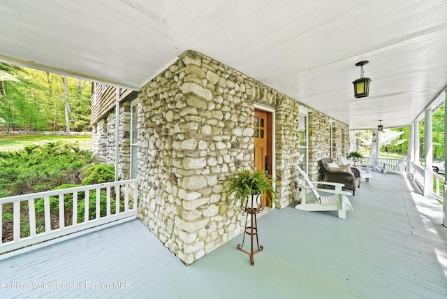 view of patio featuring covered porch