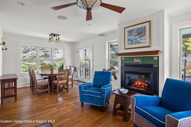 511 County Route 10, Germantown, NY 12526 - living room featuring ceiling fan, wood finished floors, and a tiled fireplace