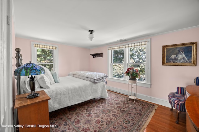 511 County Route 10, Germantown, NY 12526 - bedroom with ornamental molding, wood finished floors, and baseboards