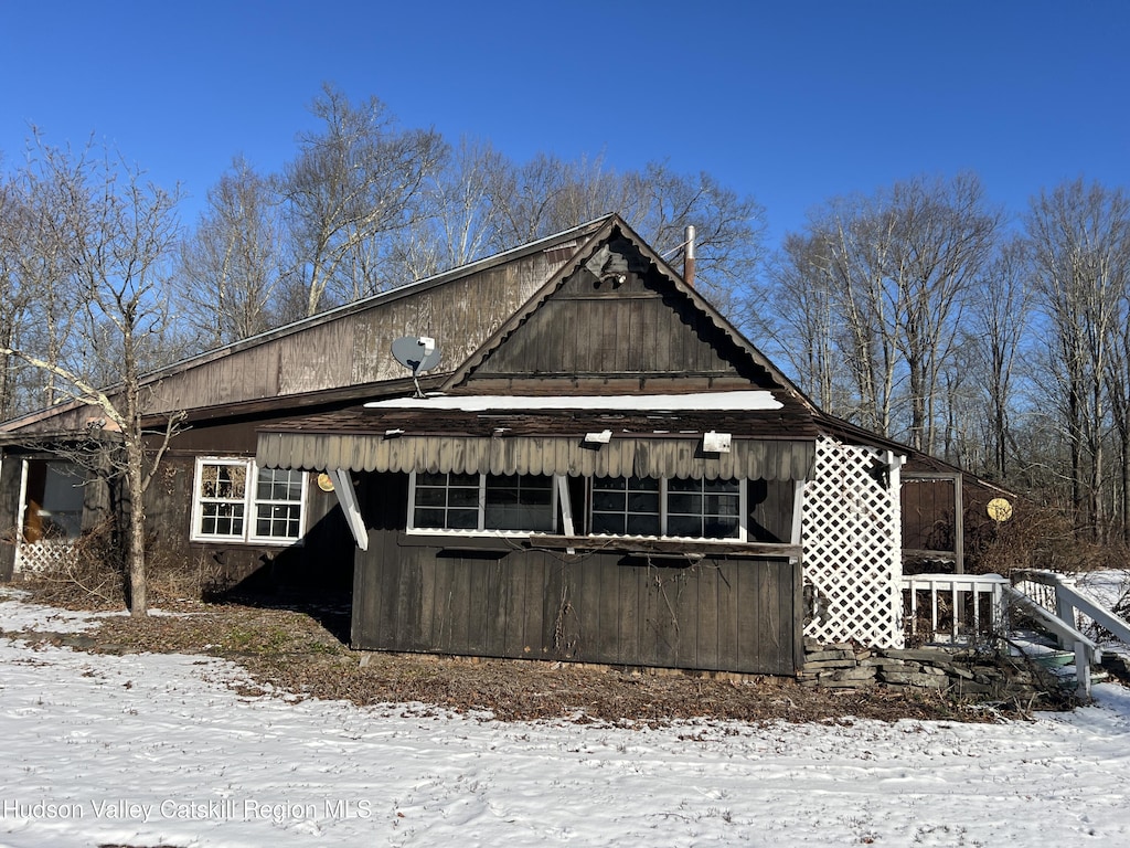 view of snow covered property