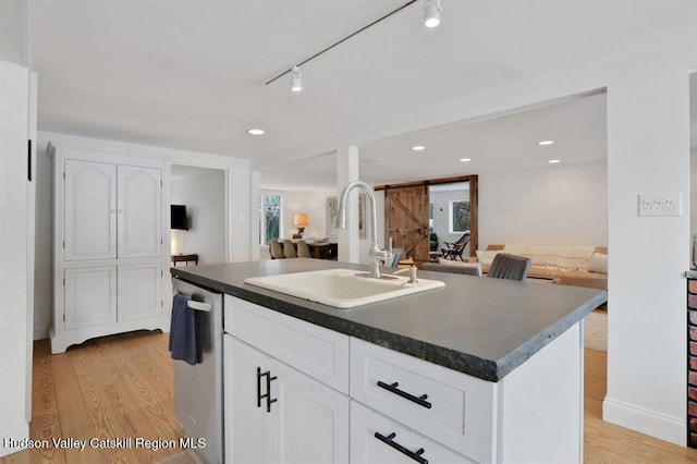 21 Schroon Hill Rd, Kerhonkson, NY 12446 - kitchen featuring a sink, light wood-style flooring, dishwasher, and open floor plan