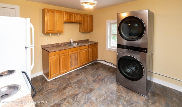 24 Grove St, Cairo, NY 12413 - washroom featuring stacked washer and clothes dryer and stone finish flooring